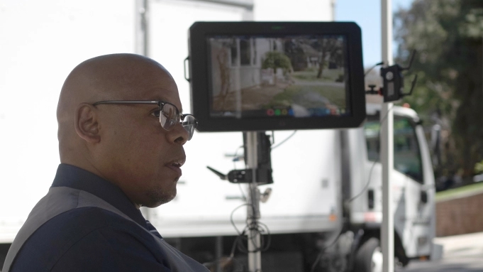 Jordan Peele and Daniel Kaluuya review footage on the set of Nope.